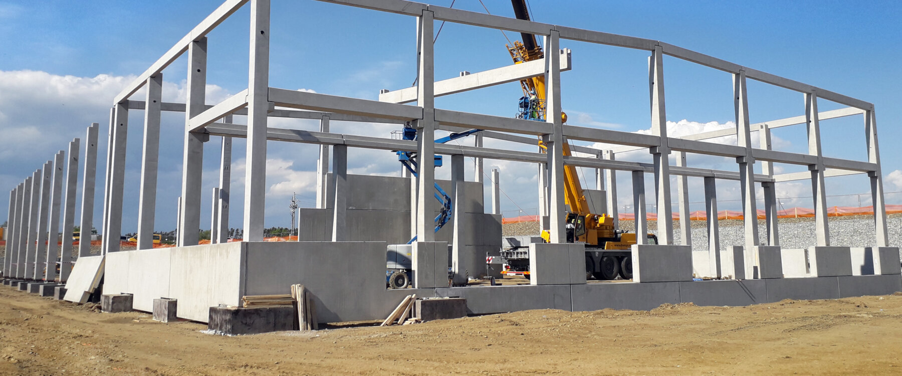 Outside view of hall construction with crane Outside view of hall construction with crane